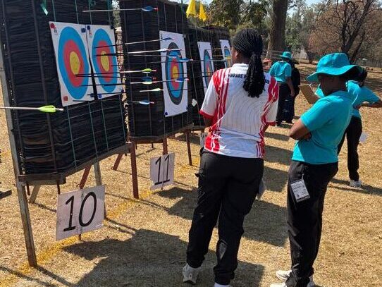 Arundel School Girls scoring and collecting arrows